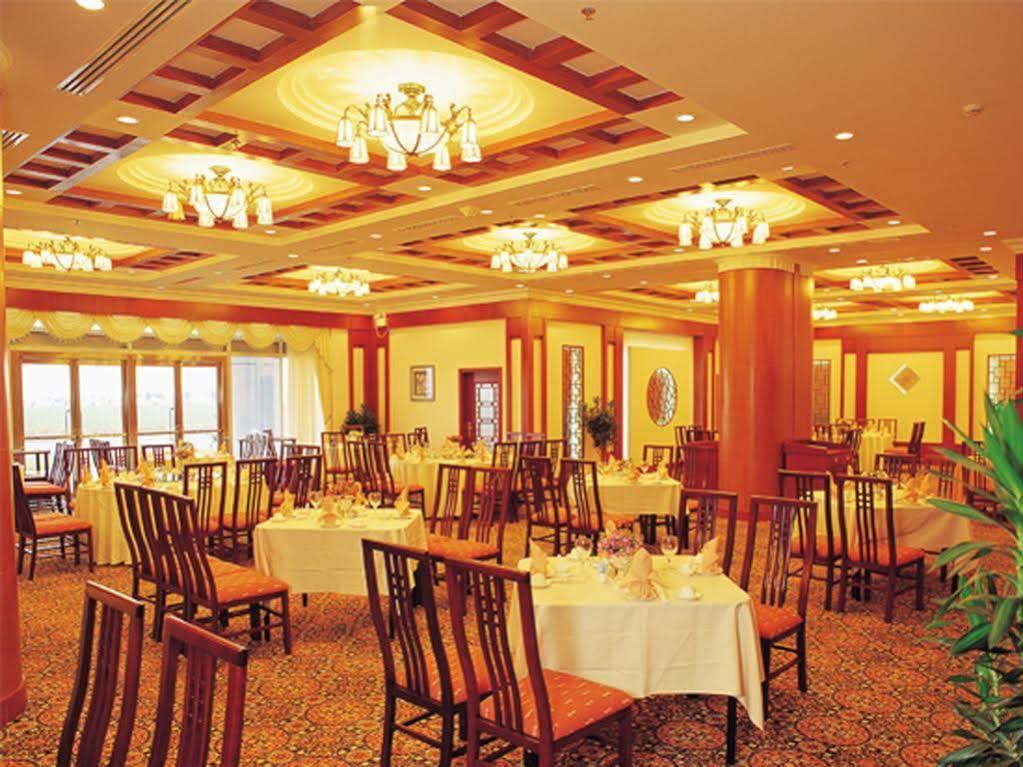 Xiamen International Seaside Hotel -Hotel Corridor Leads To The Stone Exhibition Hall Exterior foto